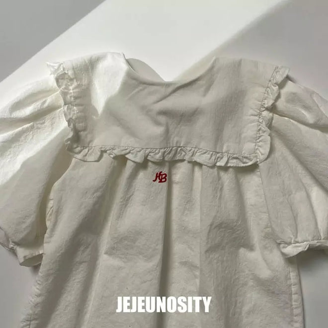 Red Symbol White Dress